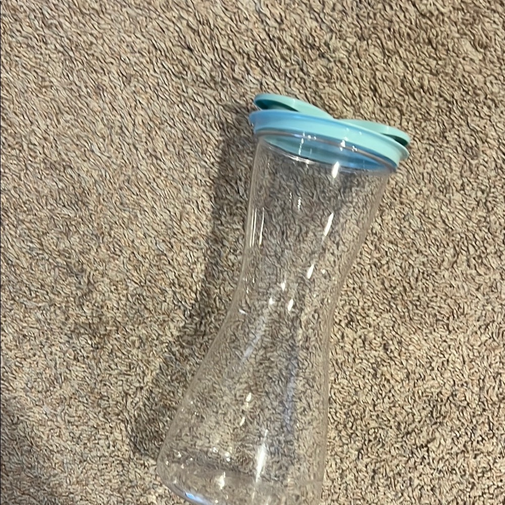 Clear Plastic water with Blue Lid